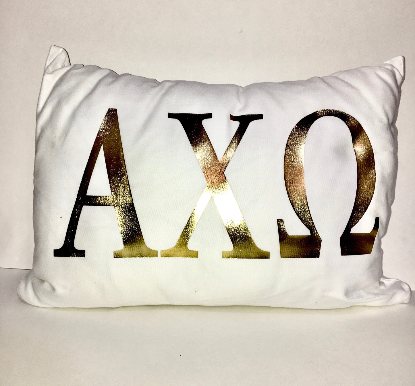 Alpha Chi Omega White pillow with gold letters